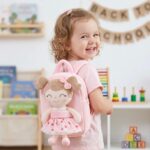شنطه صغيره مع دميه معلقه